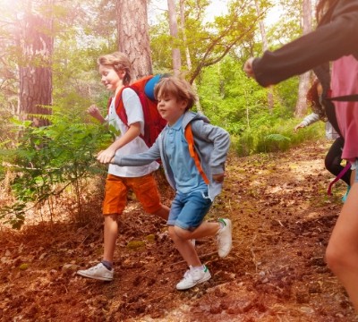 Kids running on hiking trail