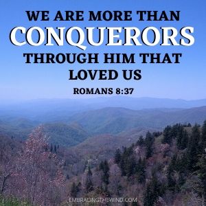 We are more than conquerors through Him and picture of mountain